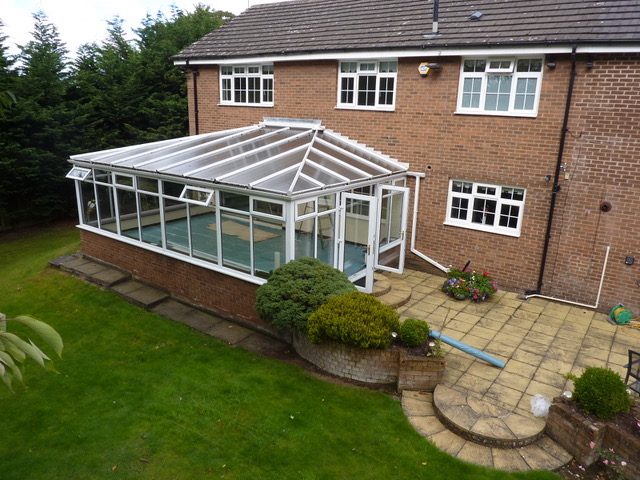 Old polycarbonate conservatory roof before replacement